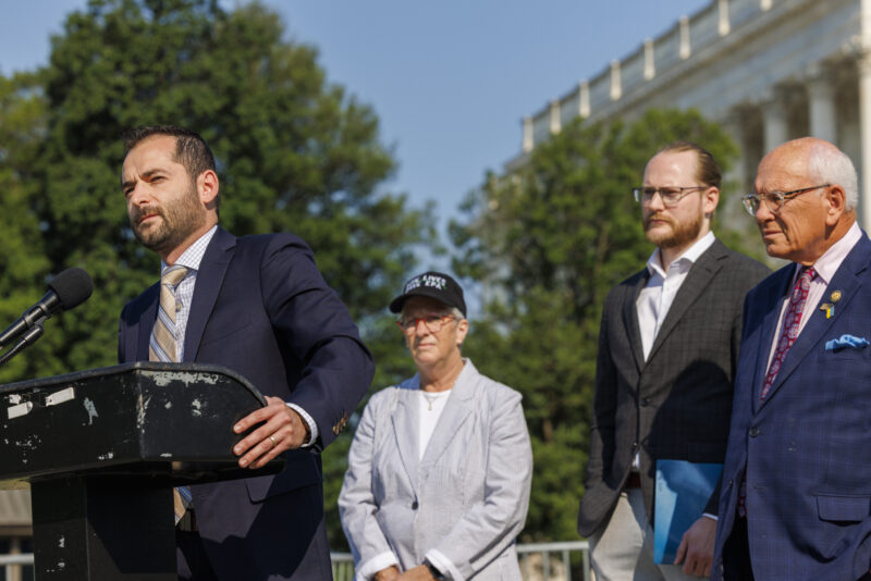 Advocates speaking at an outdoor press conference on Capitol Hill.