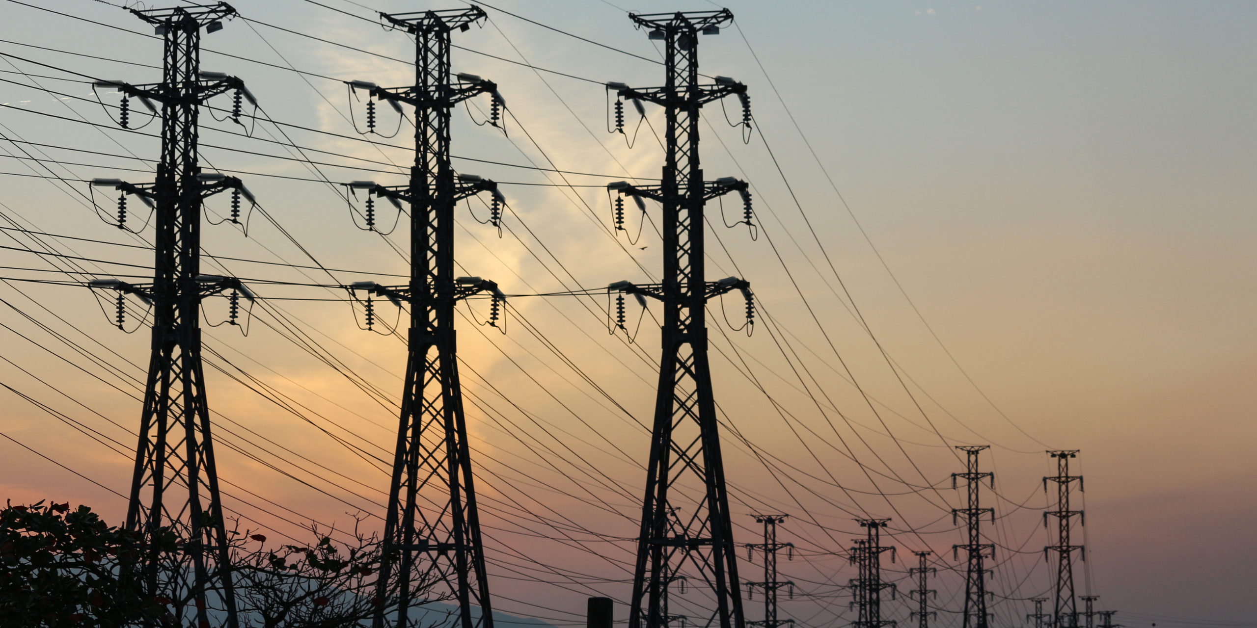 Transmission lines at sunset.