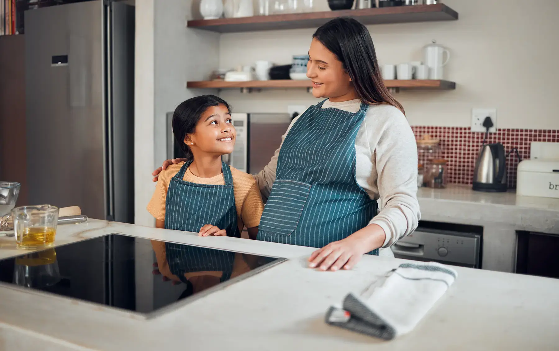 Induction stoves don’t emit any harmful air pollution and are easier to clean. (peopleimages / Getty Images)